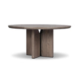 Inspired by minimalist Nordic design, a grey-finished oak dining table has a base of four plinth legs for a simple but impactful detail Amethyst Home provides interior design, new home construction design consulting, vintage area rugs, and lighting in the Los Angeles metro area.