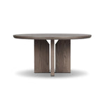Inspired by minimalist Nordic design, a grey-finished oak dining table has a base of four plinth legs for a simple but impactful detail Amethyst Home provides interior design, new home construction design consulting, vintage area rugs, and lighting in the Omaha metro area.