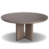 Inspired by minimalist Nordic design, a grey-finished oak dining table has a base of four plinth legs for a simple but impactful detail Amethyst Home provides interior design, new home construction design consulting, vintage area rugs, and lighting in the Park City metro area.