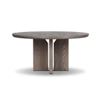 Inspired by minimalist Nordic design, a grey-finished oak dining table has a base of four plinth legs for a simple but impactful detail Amethyst Home provides interior design, new home construction design consulting, vintage area rugs, and lighting in the Scottsdale metro area.