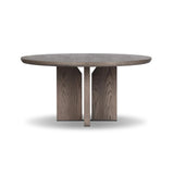 Inspired by minimalist Nordic design, a grey-finished oak dining table has a base of four plinth legs for a simple but impactful detail Amethyst Home provides interior design, new home construction design consulting, vintage area rugs, and lighting in the Scottsdale metro area.