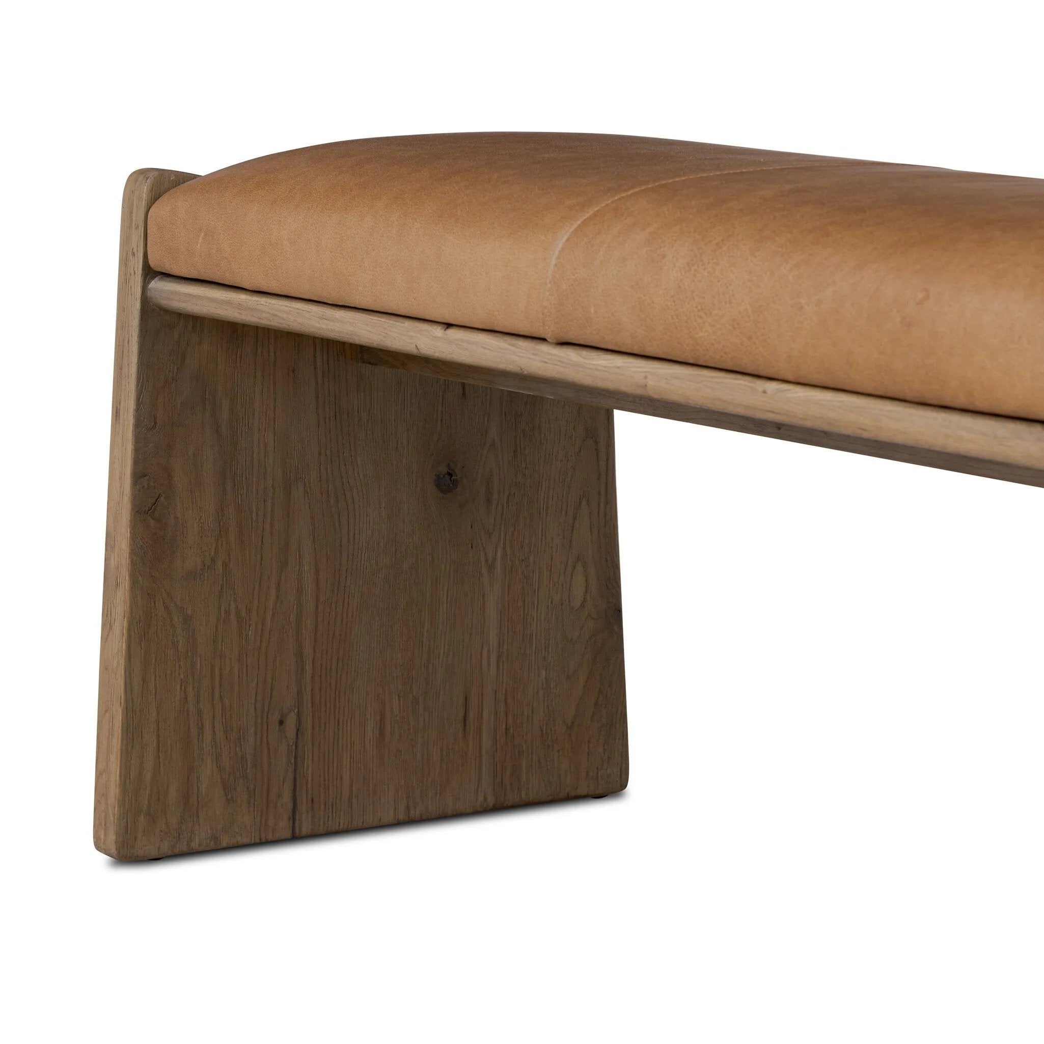 Top-grain leather and worn, solid oak fuse for a substantial, streamlined bench inspired by Nordic Minimalism Amethyst Home provides interior design, new home construction design consulting, vintage area rugs, and lighting in the Calabasas metro area.