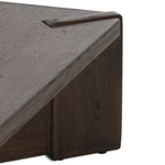 A simple shape is elevated with an X-style cradle base and pull through detailing. Made of solid oak, featuring a deep tobacco finish Amethyst Home provides interior design, new home construction design consulting, vintage area rugs, and lighting in the Houston metro area.