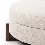 Get extra storage and an extra spot for lounging or propped feet in one. This coffee table-sized storage ottoman features a loose top to store extra blankets and more. Upholstered in a textural boucle-like performance fabric, perfect for everyday messes. Finished with an X-frame parawood base in a walnut-inspired finish. Amethyst Home provides interior design, new home construction design consulting, vintage area rugs, and lighting in the Austin metro area.