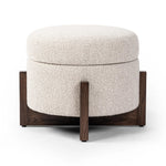 Get extra storage and an extra spot for lounging or propped feet in one. This coffee table-sized storage ottoman features a loose top to store extra blankets and more. Upholstered in a textural boucle-like performance fabric, perfect for everyday messes. Finished with an X-frame parawood base in a walnut-inspired finish. Amethyst Home provides interior design, new home construction design consulting, vintage area rugs, and lighting in the Boston metro area.
