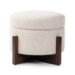 Get extra storage and an extra spot for lounging or propped feet in one. This coffee table-sized storage ottoman features a loose top to store extra blankets and more. Upholstered in a textural boucle-like performance fabric, perfect for everyday messes. Finished with an X-frame parawood base in a walnut-inspired finish. Amethyst Home provides interior design, new home construction design consulting, vintage area rugs, and lighting in the Miami metro area.