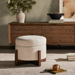 Get extra storage and an extra spot for lounging or propped feet in one. This coffee table-sized storage ottoman features a loose top to store extra blankets and more. Upholstered in a textural boucle-like performance fabric, perfect for everyday messes. Finished with an X-frame parawood base in a walnut-inspired finish. Amethyst Home provides interior design, new home construction design consulting, vintage area rugs, and lighting in the Seattle metro area.