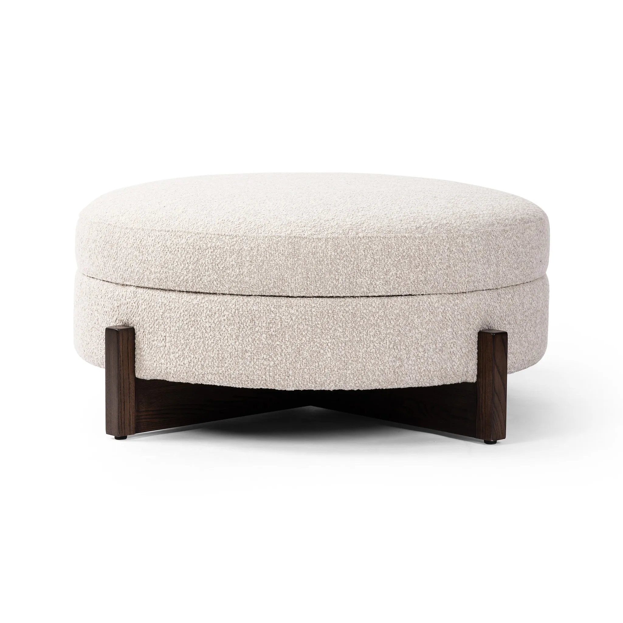 Get extra storage and an extra spot for lounging or propped feet in one. This coffee table-sized storage ottoman features a loose top to store extra blankets and more. Upholstered in a textural boucle-like performance fabric, perfect for everyday messes. Finished with an X-frame parawood base in a walnut-inspired finish. Amethyst Home provides interior design, new home construction design consulting, vintage area rugs, and lighting in the Winter Garden metro area.