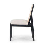 Ebony nettlewood shapes the arched, angled back of this simply shaped, armless dining chair. Natural crosshatch cane adds a light texture to complement the creamy, neutral upholstered seat. Performance fabrics are specially created to withstand spills, stains, high traffic and wear, ensuring long-term comfort and unmatched durability Amethyst Home provides interior design, new home construction design consulting, vintage area rugs, and lighting in the Laguna Beach metro area.