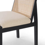 Ebony nettlewood shapes the arched, angled back of this simply shaped, armless dining chair. Natural crosshatch cane adds a light texture to complement the creamy, neutral upholstered seat. Performance fabrics are specially created to withstand spills, stains, high traffic and wear, ensuring long-term comfort and unmatched durability Amethyst Home provides interior design, new home construction design consulting, vintage area rugs, and lighting in the Miami metro area.