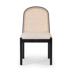 Ebony nettlewood shapes the arched, angled back of this simply shaped, armless dining chair. Natural crosshatch cane adds a light texture to complement the creamy, neutral upholstered seat. Performance fabrics are specially created to withstand spills, stains, high traffic and wear, ensuring long-term comfort and unmatched durability Amethyst Home provides interior design, new home construction design consulting, vintage area rugs, and lighting in the Newport Beach metro area.