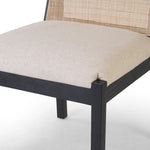 Ebony nettlewood shapes the arched, angled back of this simply shaped, armless dining chair. Natural crosshatch cane adds a light texture to complement the creamy, neutral upholstered seat. Performance fabrics are specially created to withstand spills, stains, high traffic and wear, ensuring long-term comfort and unmatched durability Amethyst Home provides interior design, new home construction design consulting, vintage area rugs, and lighting in the Seattle metro area.