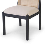 Ebony nettlewood shapes the arched, angled back of this simply shaped, armless dining chair. Natural crosshatch cane adds a light texture to complement the creamy, neutral upholstered seat. Performance fabrics are specially created to withstand spills, stains, high traffic and wear, ensuring long-term comfort and unmatched durability Amethyst Home provides interior design, new home construction design consulting, vintage area rugs, and lighting in the Winter Garden metro area.