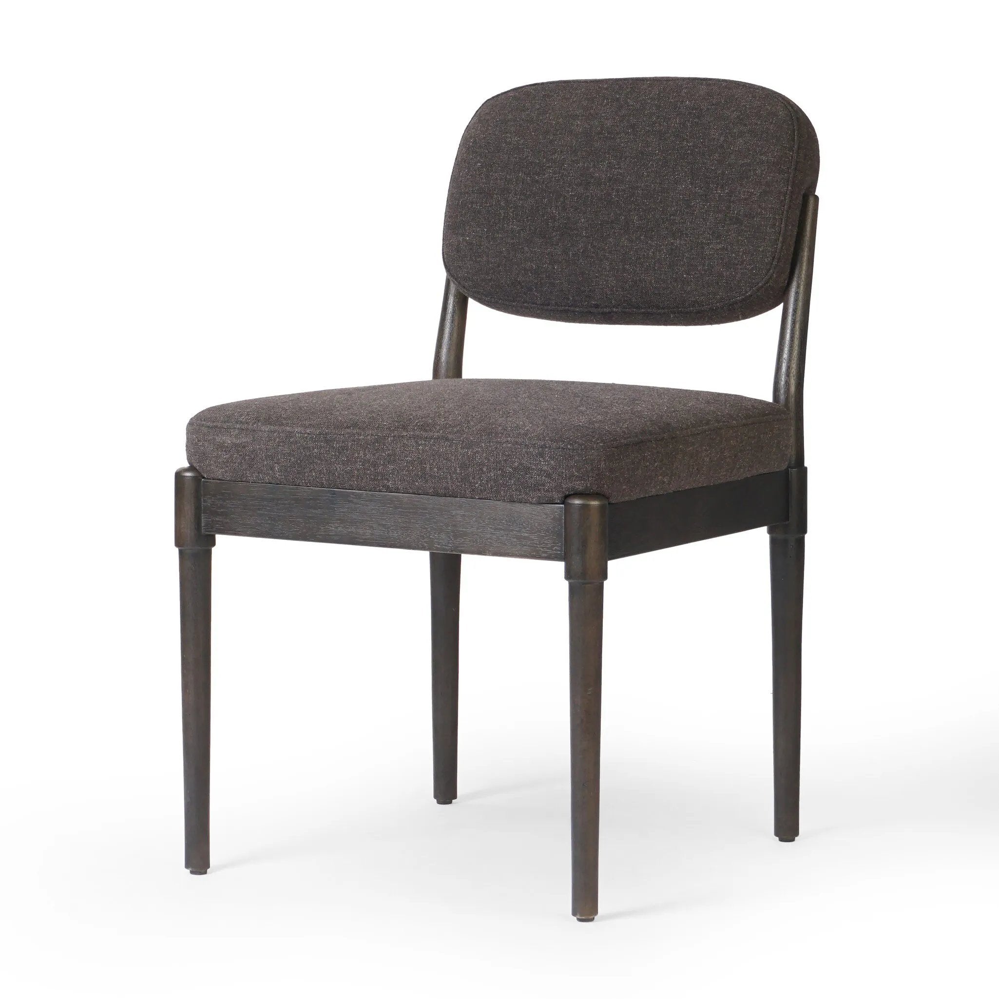 Featuring Esther Antwerp Noir Dining Chair by Four Hands at Amethyst Home. Modern materials place an updated twist on the traditional armless dining chair. Linen/cotton blend cushioning upholstered in high-performance fabric, perfect for everyday dining. Simply framed by burnt oak. Performance fabrics are specially created to withstand spills, stains, h. Amethyst Home provides interior design, new home construction design consulting, vintage area rugs, and lighting in the Winter Garden metro area.
