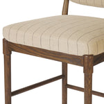 Modern materials place an updated twist on the traditional bar stool. Linen/cotton blend cushioning features a faint pinstripe for a unique-while-versatile look. Simply framed by brown oak and perfect in pairs or multiples Amethyst Home provides interior design, new home construction design consulting, vintage area rugs, and lighting in the Boston metro area.