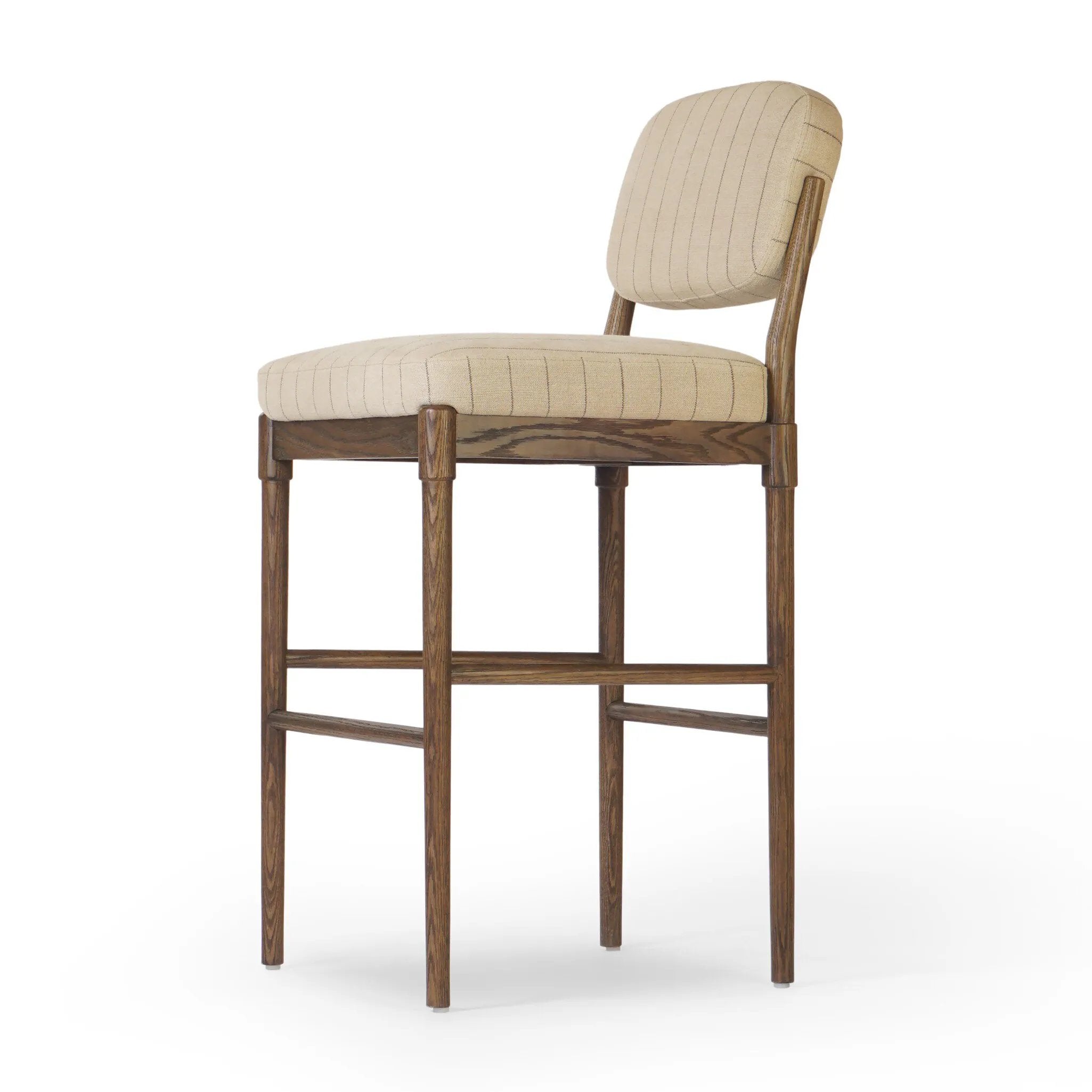 Modern materials place an updated twist on the traditional bar stool. Linen/cotton blend cushioning features a faint pinstripe for a unique-while-versatile look. Simply framed by brown oak and perfect in pairs or multiples Amethyst Home provides interior design, new home construction design consulting, vintage area rugs, and lighting in the Charlotte metro area.
