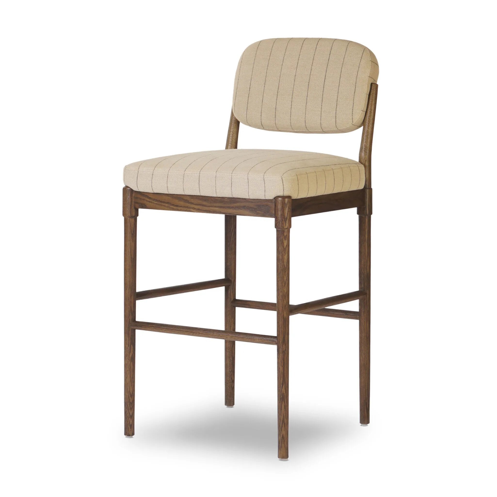 Modern materials place an updated twist on the traditional bar stool. Linen/cotton blend cushioning features a faint pinstripe for a unique-while-versatile look. Simply framed by brown oak and perfect in pairs or multiples Amethyst Home provides interior design, new home construction design consulting, vintage area rugs, and lighting in the Dallas metro area.