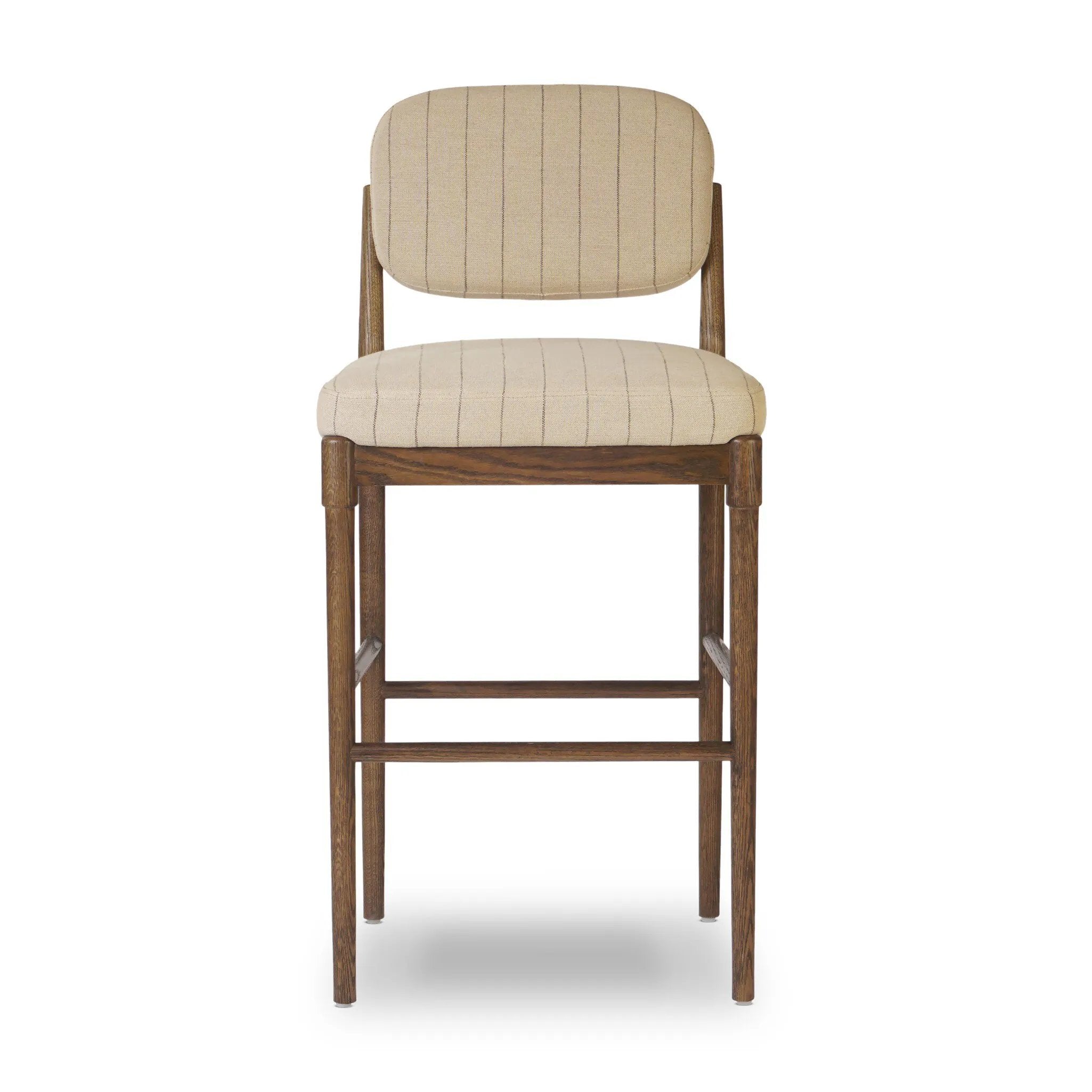 Modern materials place an updated twist on the traditional bar stool. Linen/cotton blend cushioning features a faint pinstripe for a unique-while-versatile look. Simply framed by brown oak and perfect in pairs or multiples Amethyst Home provides interior design, new home construction design consulting, vintage area rugs, and lighting in the Des Moines metro area.