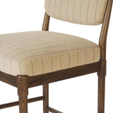 Modern materials place an updated twist on the traditional bar stool. Linen/cotton blend cushioning features a faint pinstripe for a unique-while-versatile look. Simply framed by brown oak and perfect in pairs or multiples Amethyst Home provides interior design, new home construction design consulting, vintage area rugs, and lighting in the Houston metro area.