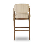 Modern materials place an updated twist on the traditional bar stool. Linen/cotton blend cushioning features a faint pinstripe for a unique-while-versatile look. Simply framed by brown oak and perfect in pairs or multiples Amethyst Home provides interior design, new home construction design consulting, vintage area rugs, and lighting in the Miami metro area.