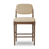 Modern materials place an updated twist on the traditional bar stool. Linen/cotton blend cushioning features a faint pinstripe for a unique-while-versatile look. Simply framed by brown oak and perfect in pairs or multiples Amethyst Home provides interior design, new home construction design consulting, vintage area rugs, and lighting in the Nashville metro area.