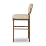 Modern materials place an updated twist on the traditional bar stool. Linen/cotton blend cushioning features a faint pinstripe for a unique-while-versatile look. Simply framed by brown oak and perfect in pairs or multiples Amethyst Home provides interior design, new home construction design consulting, vintage area rugs, and lighting in the Seattle metro area.