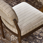 Featuring Esther Lavon Flint Dining Chair by Four Hands at Amethyst Home. Modern materials place an updated twist on the traditional armless dining chair. Linen/cotton blend cushioning features a faint pinstripe for a unique-while-versatile look. Simply framed by brown oak. Overall Dimensions: 21.25"w x 24.25"d x 33.50"h. Amethyst Home provides interior design, new home construction design consulting, vintage area rugs, and lighting in the Nashville metro area.