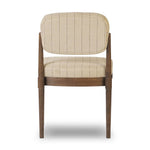 Featuring Esther Lavon Flint Dining Chair by Four Hands at Amethyst Home. Modern materials place an updated twist on the traditional armless dining chair. Linen/cotton blend cushioning features a faint pinstripe for a unique-while-versatile look. Simply framed by brown oak. Overall Dimensions: 21.25"w x 24.25"d x 33.50"h. Amethyst Home provides interior design, new home construction design consulting, vintage area rugs, and lighting in the Tampa metro area.
