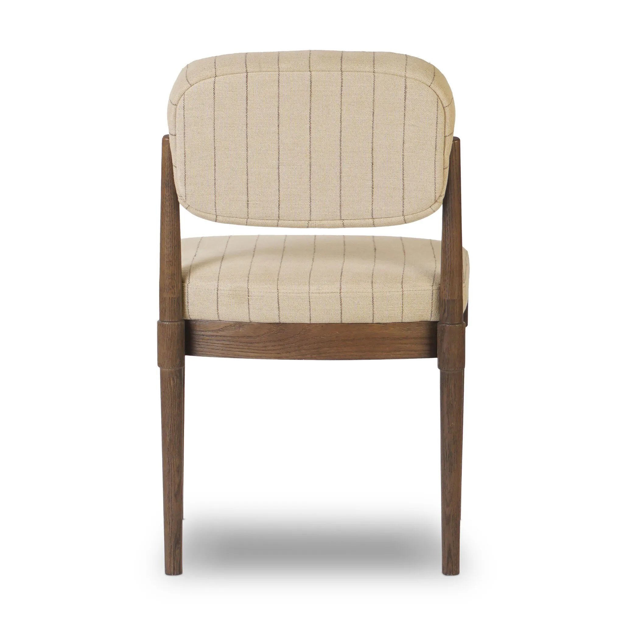 Featuring Esther Lavon Flint Dining Chair by Four Hands at Amethyst Home. Modern materials place an updated twist on the traditional armless dining chair. Linen/cotton blend cushioning features a faint pinstripe for a unique-while-versatile look. Simply framed by brown oak. Overall Dimensions: 21.25"w x 24.25"d x 33.50"h. Amethyst Home provides interior design, new home construction design consulting, vintage area rugs, and lighting in the Tampa metro area.