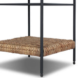Work subtle coastal vibes into any room with this mixed-material end table, pairing woven hyacinth with charcoal-finished steel. Simplified heritage ball detailing on each leg adds a design-forward touch.As fans of organic modern aesthetics at Amethyst, we love the designer inspired Evanne End Table - Charcoal Iron. Amethyst Home provides interior design, new home construction design consulting, vintage area rugs, and lighting in the Newport Beach metro area.