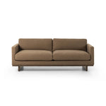Classic goes contemporary. A brown-finished parawood base supports low, deep seating of high-performance fabric, with track arms for a clean touch.As fans of clean design at Amethyst, we love the warm modern inspired Everly Sofa - Antwerp Cafe. This item pairs well with other brands such as Four Hands and is perfect for minimalist homes Amethyst Home provides interior design, new home construction design consulting, vintage area rugs, and lighting in the Alpharetta metro area.