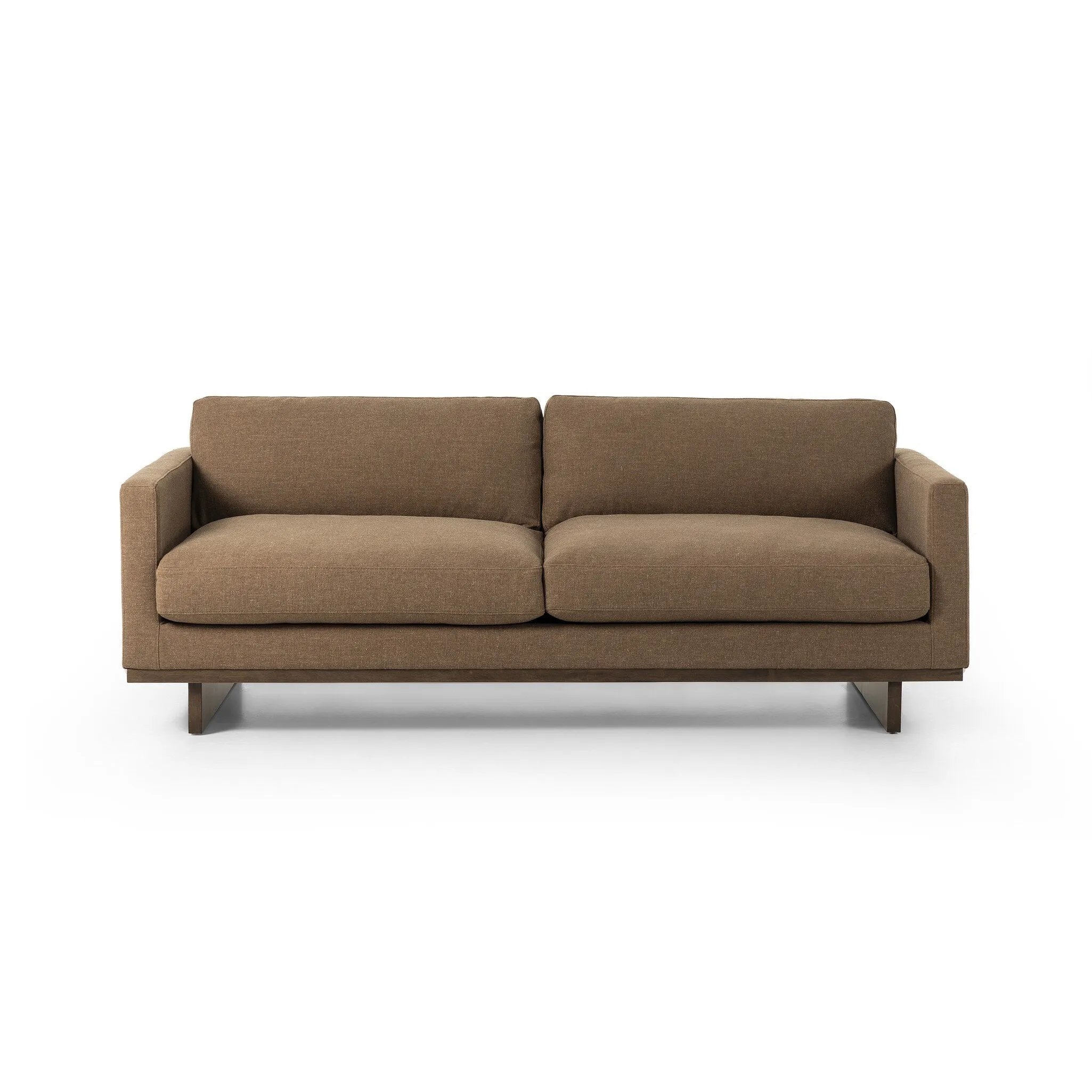 Classic goes contemporary. A brown-finished parawood base supports low, deep seating of high-performance fabric, with track arms for a clean touch.As fans of clean design at Amethyst, we love the warm modern inspired Everly Sofa - Antwerp Cafe. This item pairs well with other brands such as Four Hands and is perfect for minimalist homes Amethyst Home provides interior design, new home construction design consulting, vintage area rugs, and lighting in the Alpharetta metro area.