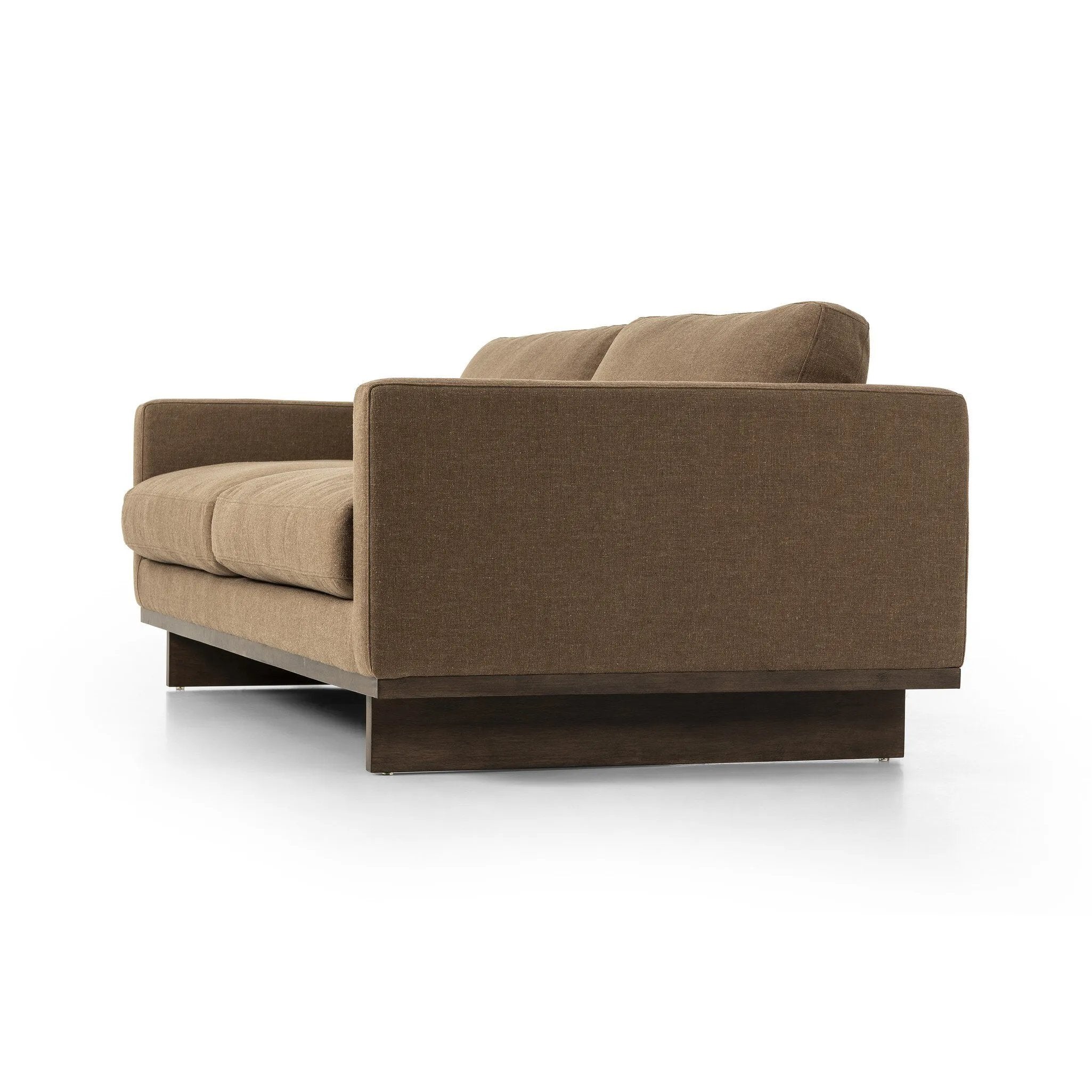 Classic goes contemporary. A brown-finished parawood base supports low, deep seating of high-performance fabric, with track arms for a clean touch.As fans of clean design at Amethyst, we love the warm modern inspired Everly Sofa - Antwerp Cafe. This item pairs well with other brands such as Four Hands and is perfect for minimalist homes Amethyst Home provides interior design, new home construction design consulting, vintage area rugs, and lighting in the Park City metro area.