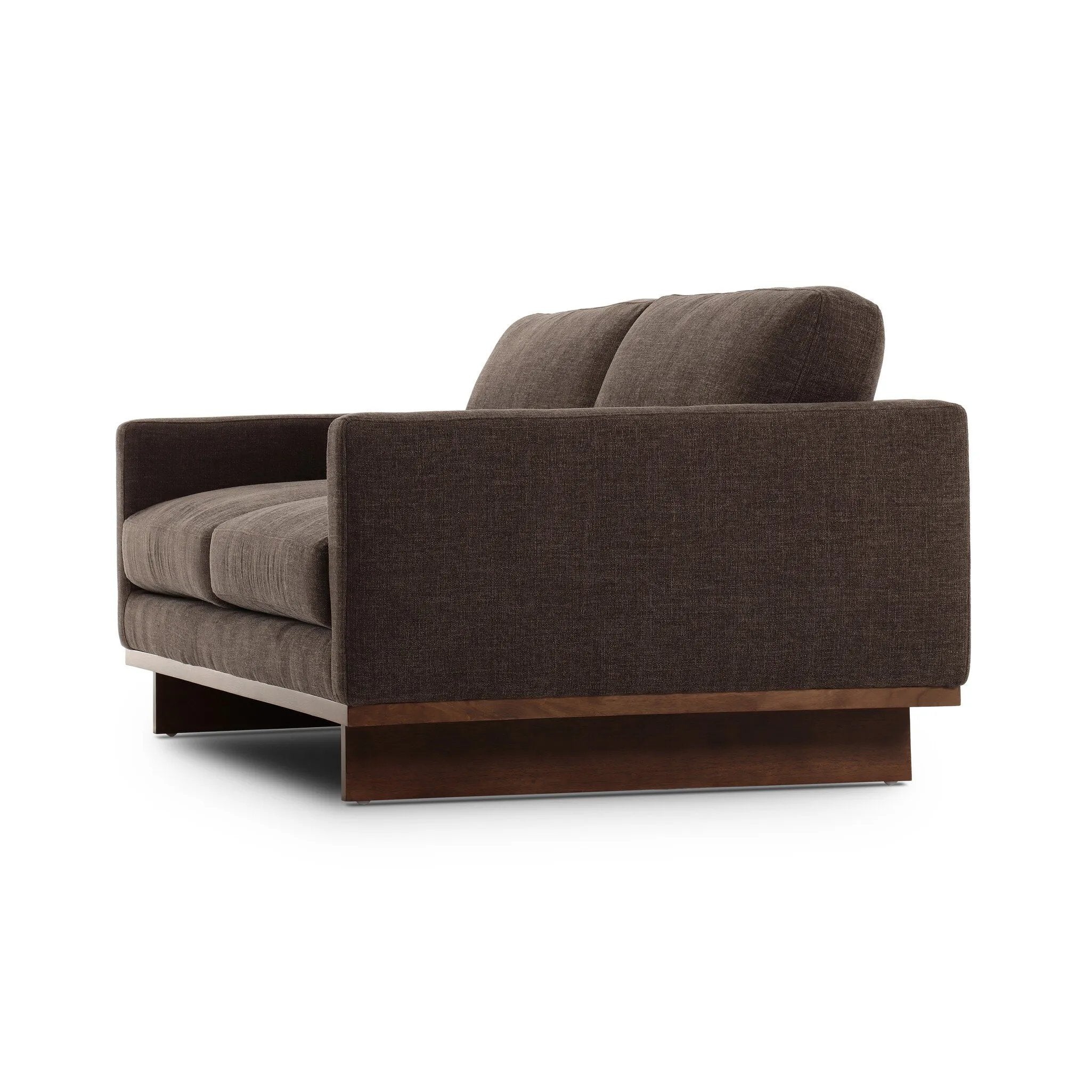 Classic goes contemporary. A brown-finished parawood base supports low, deep seating of high-performance fabric, with track arms for a clean touch.As enthusiasts of natural aesthetics at Amethyst, we love the warm modern inspired Everly Sofa - Landale Charcoal. This item pairs well with other brands such as Ethnicraft and is perfect for loft homes Amethyst Home provides interior design, new home construction design consulting, vintage area rugs, and lighting in the Des Moines metro area.