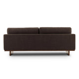 Classic goes contemporary. A brown-finished parawood base supports low, deep seating of high-performance fabric, with track arms for a clean touch.As enthusiasts of natural aesthetics at Amethyst, we love the warm modern inspired Everly Sofa - Landale Charcoal. This item pairs well with other brands such as Ethnicraft and is perfect for loft homes Amethyst Home provides interior design, new home construction design consulting, vintage area rugs, and lighting in the Monterey metro area.