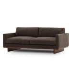 Classic goes contemporary. A brown-finished parawood base supports low, deep seating of high-performance fabric, with track arms for a clean touch.As enthusiasts of natural aesthetics at Amethyst, we love the warm modern inspired Everly Sofa - Landale Charcoal. This item pairs well with other brands such as Ethnicraft and is perfect for loft homes Amethyst Home provides interior design, new home construction design consulting, vintage area rugs, and lighting in the Washington metro area.