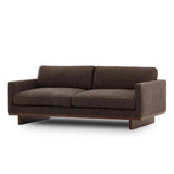 Classic goes contemporary. A brown-finished parawood base supports low, deep seating of high-performance fabric, with track arms for a clean touch.As enthusiasts of natural aesthetics at Amethyst, we love the warm modern inspired Everly Sofa - Landale Charcoal. This item pairs well with other brands such as Ethnicraft and is perfect for loft homes Amethyst Home provides interior design, new home construction design consulting, vintage area rugs, and lighting in the Washington metro area.