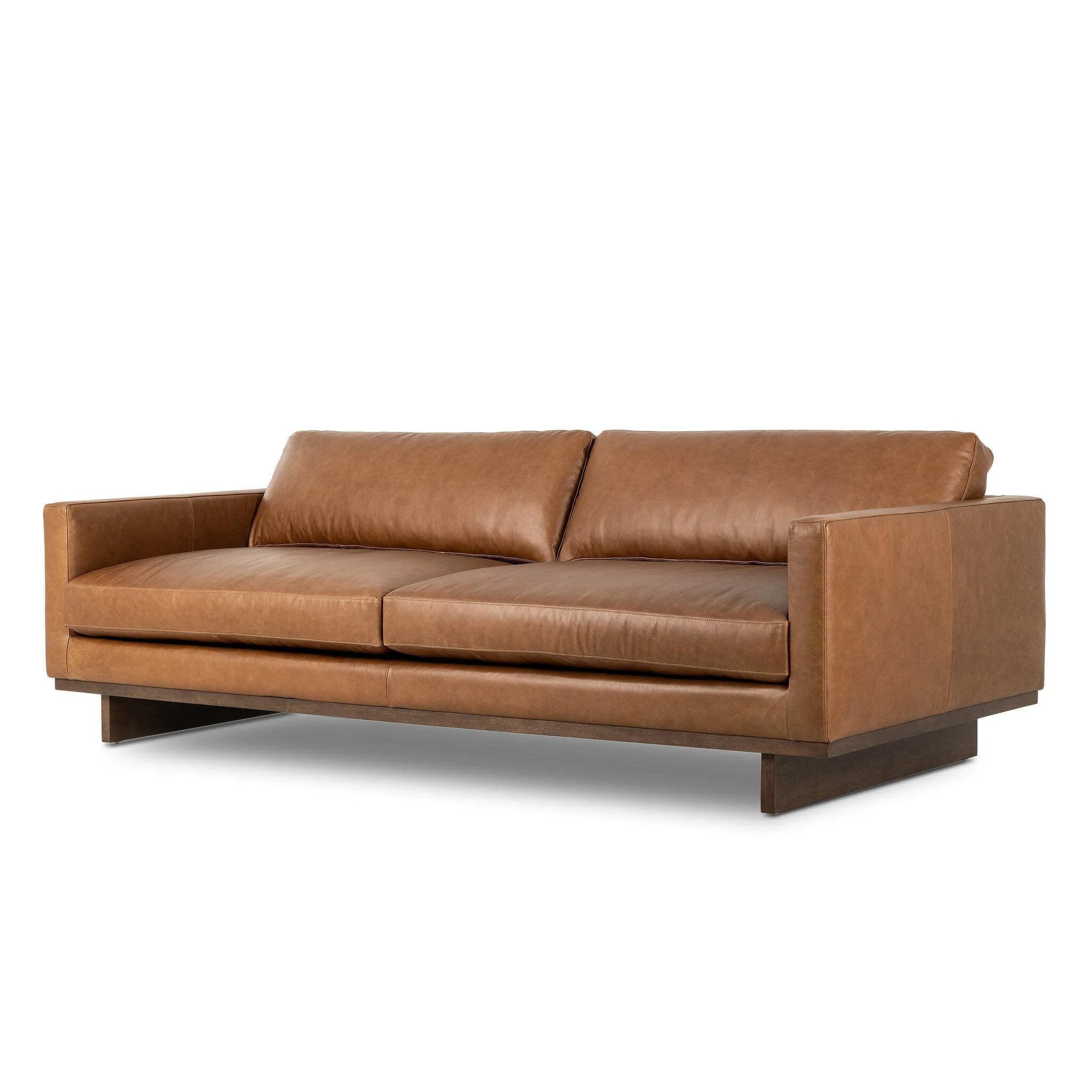 Classic goes contemporary. A brown-finished wood base supports low, deep seating of high-top-grain leather, with track arms for a clean touch.As fans of organic modern style at Amethyst, we love the nature inspired Everly Sofa - Sonoma Chestnut. This item pairs well with other brands such as Visual Comfort and is perfect for modern homes Amethyst Home provides interior design, new home construction design consulting, vintage area rugs, and lighting in the Des Moines metro area.