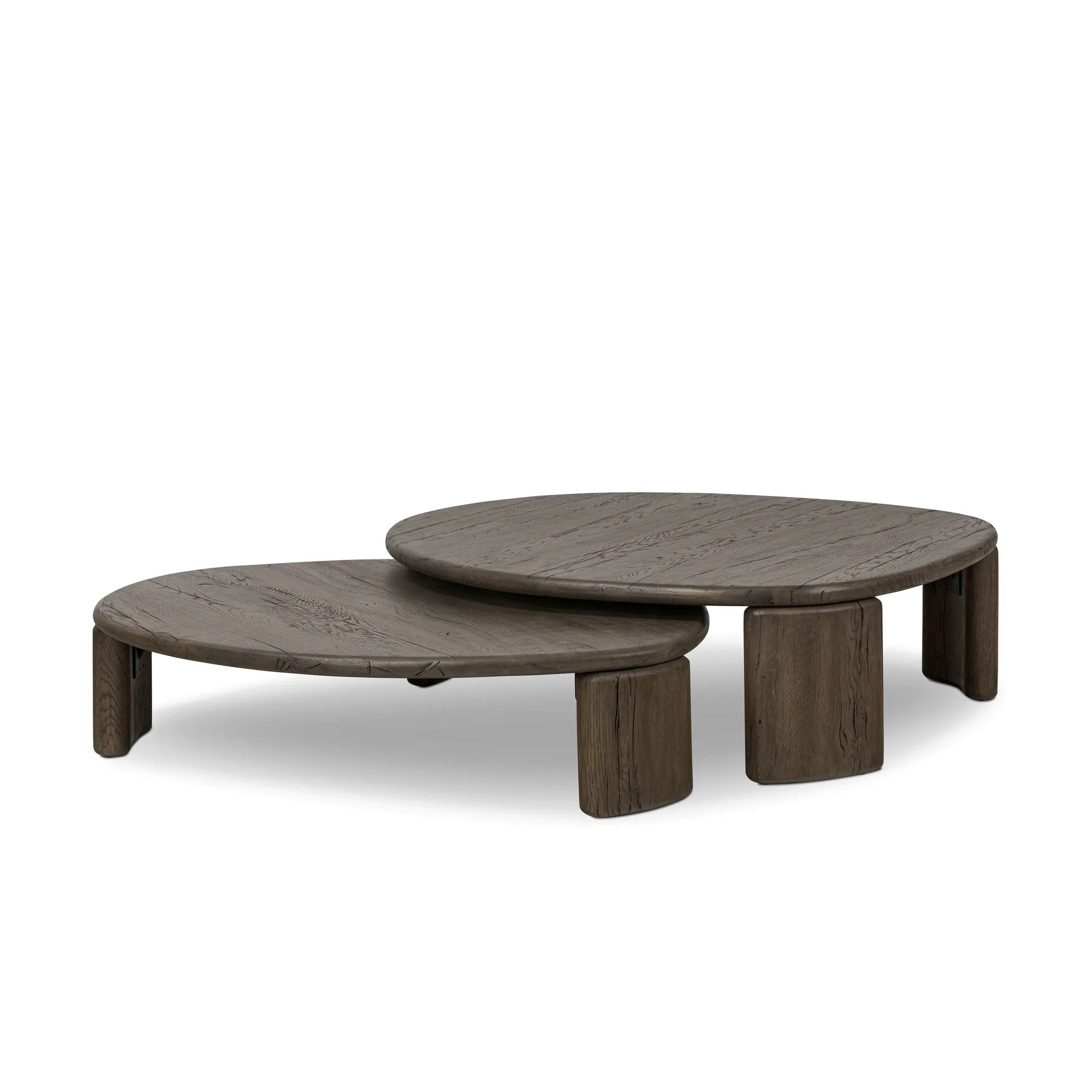 Inspired by Brazilian midcentury, a set of shapely nesting tables pairs bases of solid reclaimed French oak. Designed in partnership with longtime Four Hands collaborator Thomas Bina and Brazilian designer Ronald Sasson Amethyst Home provides interior design, new home construction design consulting, vintage area rugs, and lighting in the Laguna Beach metro area.