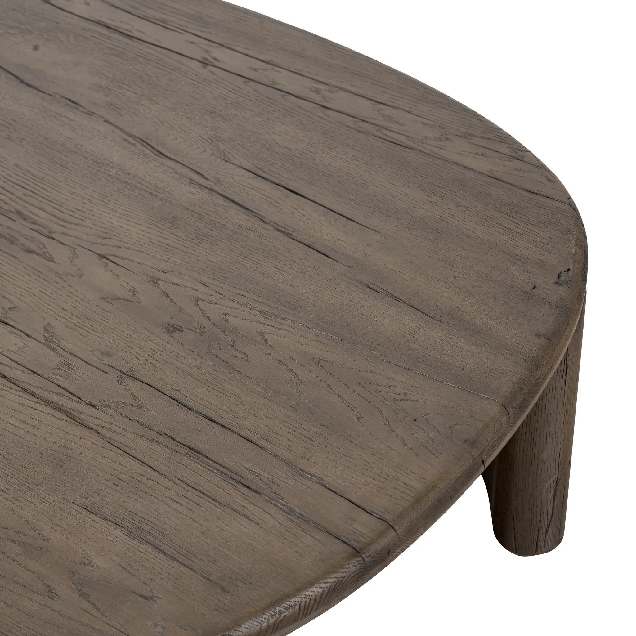 A organically shapely coffee table made from solid reclaimed French oak. Designed in partnership with longtime Four Hands collaborator Thomas Bina and Brazilian designer Ronald Sasson Amethyst Home provides interior design, new home construction design consulting, vintage area rugs, and lighting in the Laguna Beach metro area.
