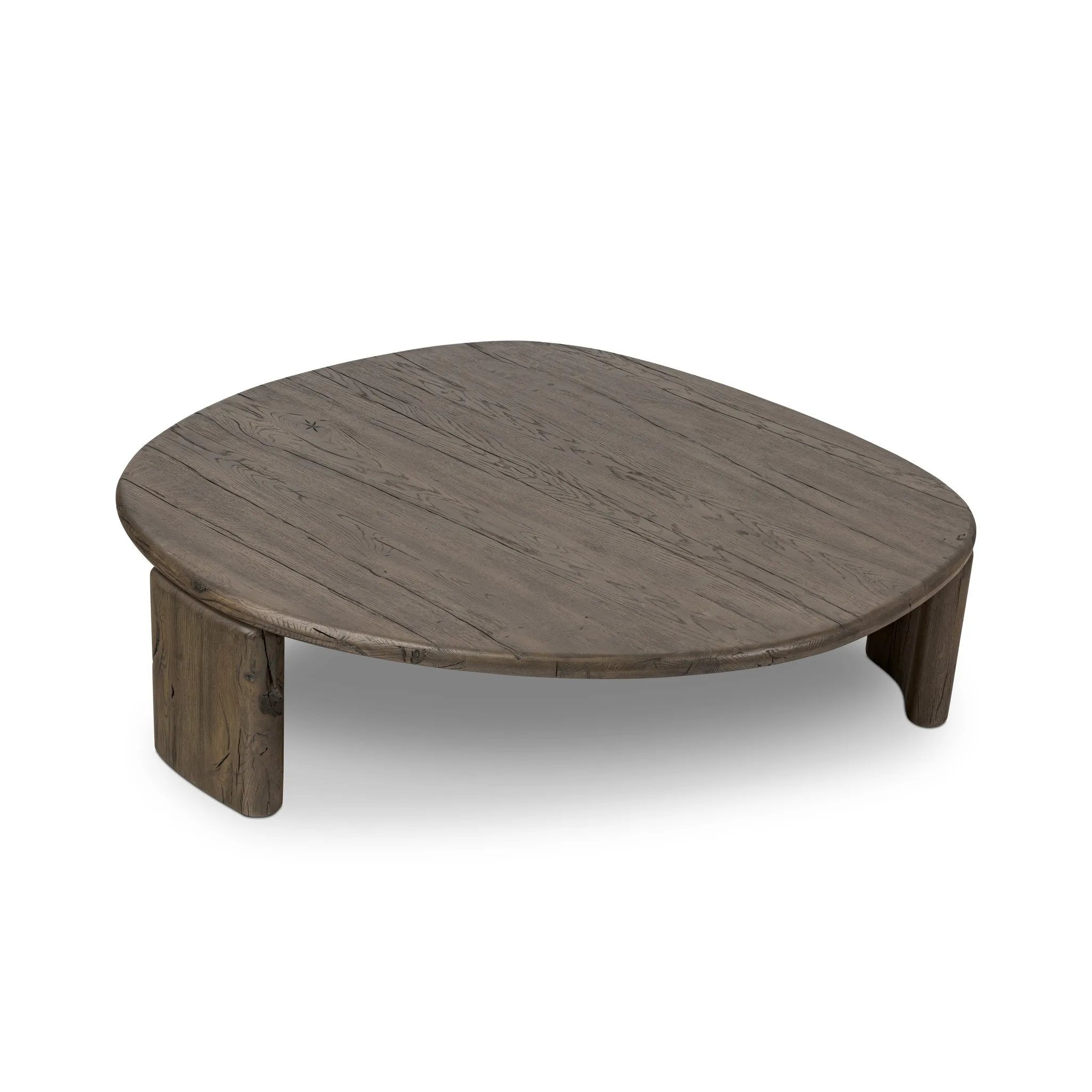 A organically shapely coffee table made from solid reclaimed French oak. Designed in partnership with longtime Four Hands collaborator Thomas Bina and Brazilian designer Ronald Sasson Amethyst Home provides interior design, new home construction design consulting, vintage area rugs, and lighting in the Los Angeles metro area.