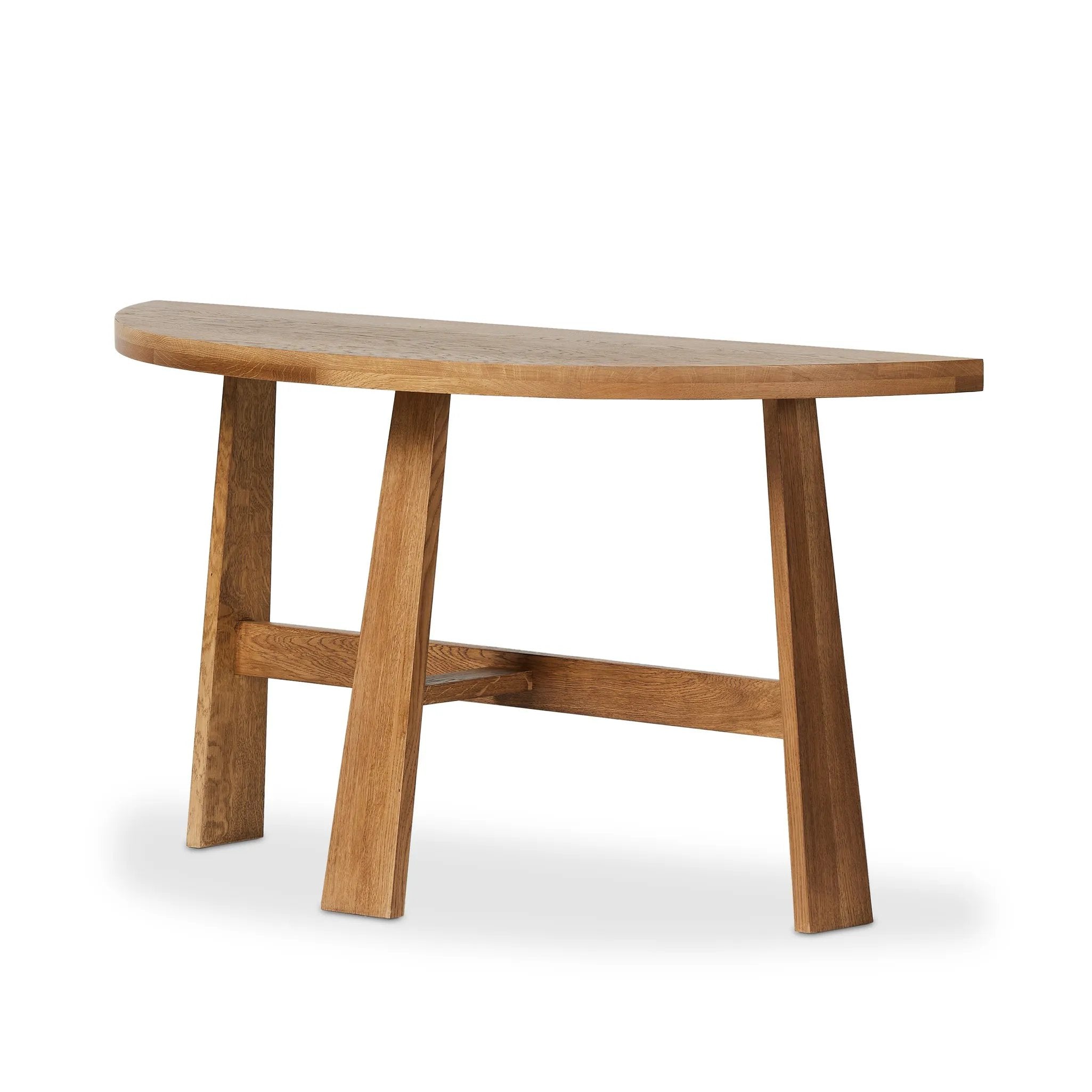 Made from light brown oak, a tripod base supports a uniquely shaped tabletop for a look that feels both simple and artistic Amethyst Home provides interior design, new home construction design consulting, vintage area rugs, and lighting in the Boston metro area.