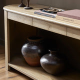 Featuring Farrow Drifted Oak Veneer Console Table by Four Hands at Amethyst Home. A simple pill-shaped console table, refreshed with intriguing design details. Made from warm, light-finished oak, open lower shelving creates endless storage and styling options for your living or media room. Three drawers bring even more storage, while bullnose and relief . Amethyst Home provides interior design, new home construction design consulting, vintage area rugs, and lighting in the Laguna Beach metro area.