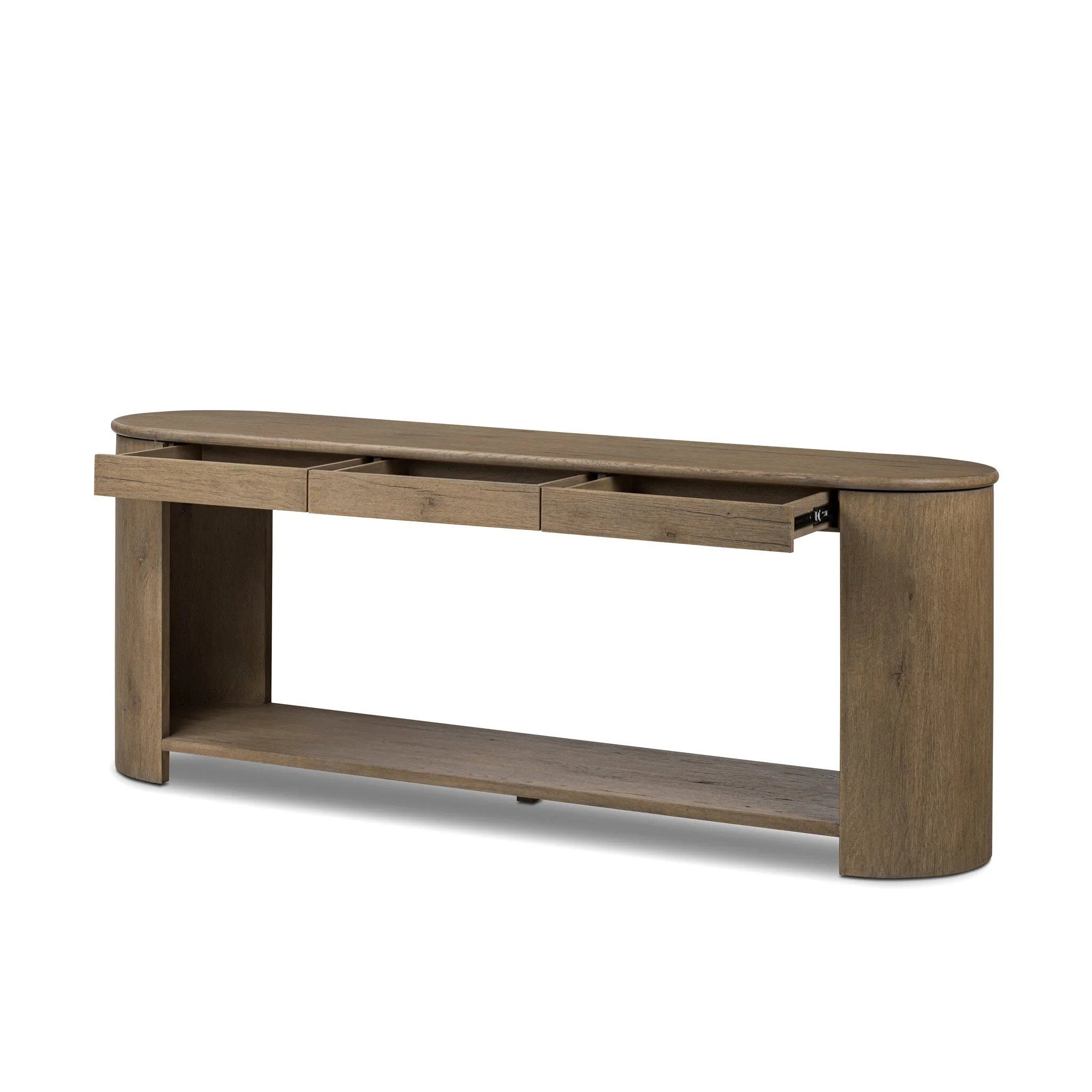 Featuring Farrow Drifted Oak Veneer Console Table by Four Hands at Amethyst Home. A simple pill-shaped console table, refreshed with intriguing design details. Made from warm, light-finished oak, open lower shelving creates endless storage and styling options for your living or media room. Three drawers bring even more storage, while bullnose and relief det. Amethyst Home provides interior design, new home construction design consulting, vintage area rugs, and lighting in the Nashville metro area.