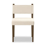 Mixed materials at their finest. Brown parawood forms a slight, simple frame for squared seating of neutral performance-grade upholstery. Charcoal top-grain leather backing takes this modern-minded dining chair to the next level Amethyst Home provides interior design, new home construction design consulting, vintage area rugs, and lighting in the Nashville metro area.