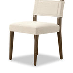 Mixed materials at their finest. Brown parawood forms a slight, simple frame for squared seating of neutral performance-grade upholstery. Charcoal top-grain leather backing takes this modern-minded dining chair to the next level Amethyst Home provides interior design, new home construction design consulting, vintage area rugs, and lighting in the Newport Beach metro area.