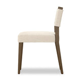 Mixed materials at their finest. Brown parawood forms a slight, simple frame for squared seating of neutral performance-grade upholstery. Charcoal top-grain leather backing takes this modern-minded dining chair to the next level Amethyst Home provides interior design, new home construction design consulting, vintage area rugs, and lighting in the Salt Lake City metro area.