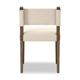 Mixed materials at their finest. Brown parawood forms a slight, simple frame for squared seating of neutral performance-grade upholstery. Charcoal top-grain leather backing takes this modern-minded dining chair to the next level Amethyst Home provides interior design, new home construction design consulting, vintage area rugs, and lighting in the Scottsdale metro area.