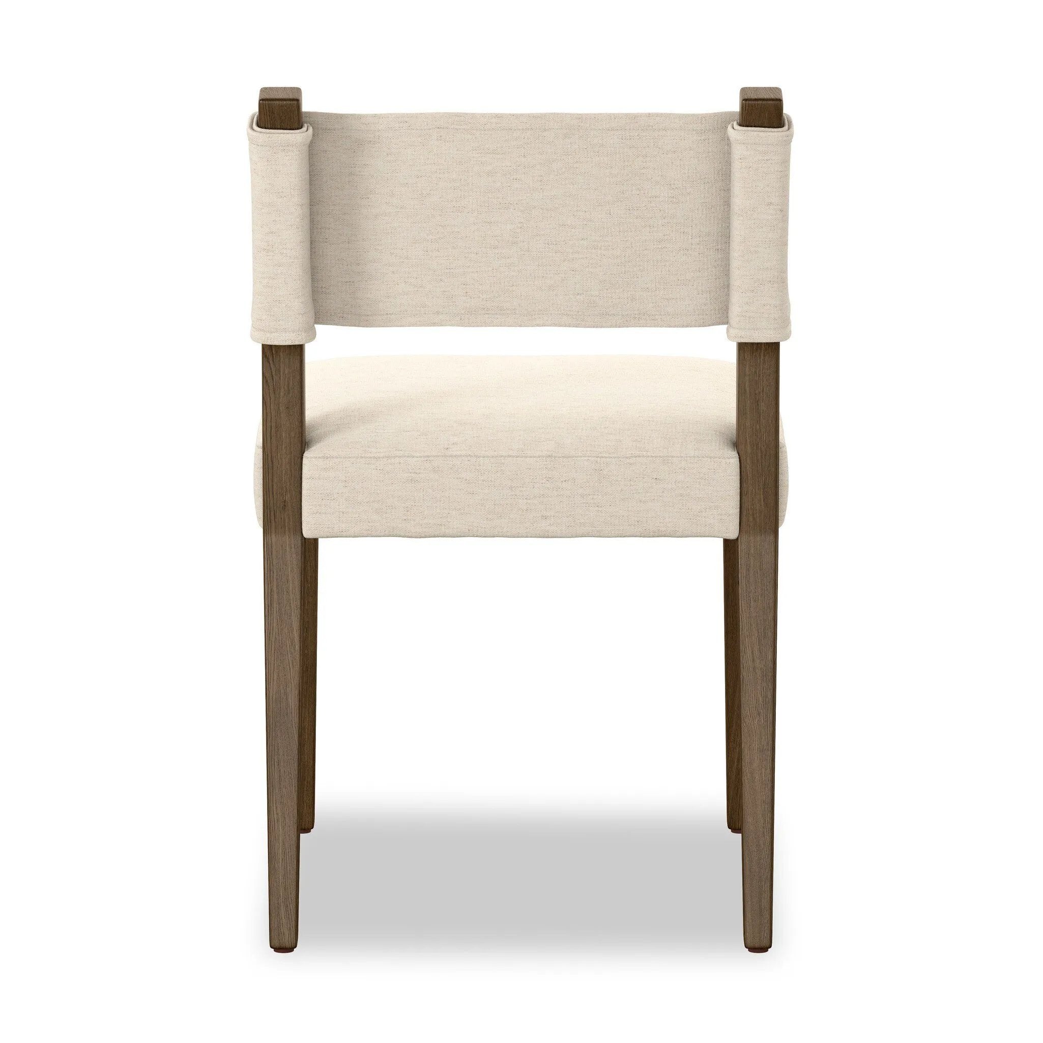 Mixed materials at their finest. Brown parawood forms a slight, simple frame for squared seating of neutral performance-grade upholstery. Charcoal top-grain leather backing takes this modern-minded dining chair to the next level Amethyst Home provides interior design, new home construction design consulting, vintage area rugs, and lighting in the Scottsdale metro area.