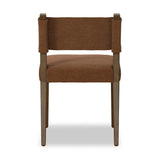 Mixed materials at their finest. Brown parawood forms a slight, simple frame for squared seating of neutral performance-grade upholstery. Charcoal top-grain leather backing takes this modern-minded dining chair to the next level Amethyst Home provides interior design, new home construction design consulting, vintage area rugs, and lighting in the Nashville metro area.